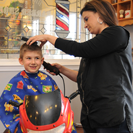 Kid Having a Haircut